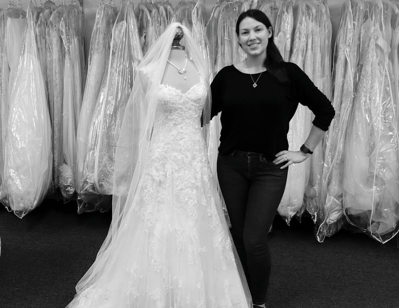 Karie in bridal store with wedding dress in melbourne, FL